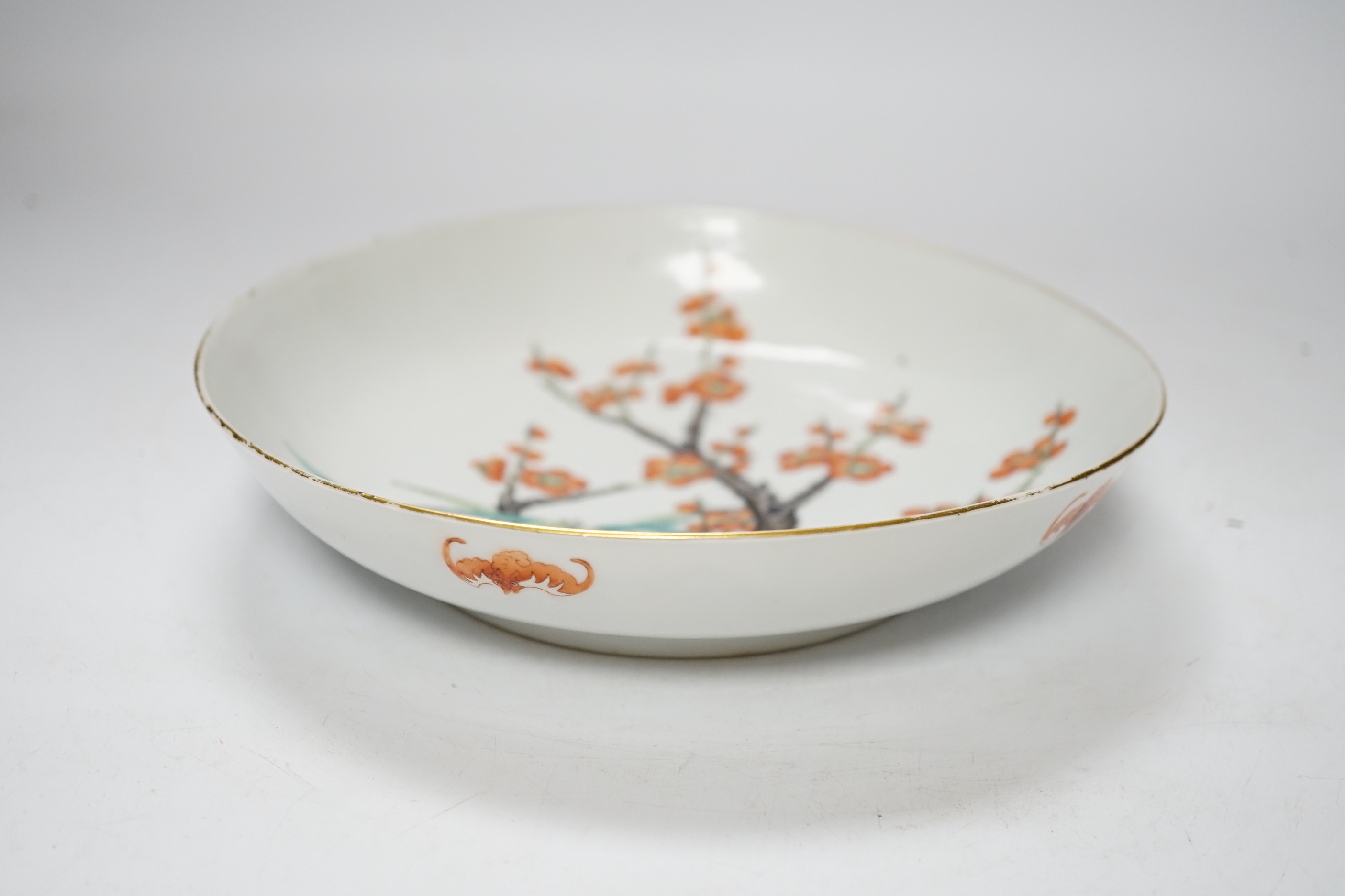 A Chinese enamelled porcelain ‘prunus’ saucer dish, Guangxu six character mark and of the period (1875-1908), 21cm diameter
